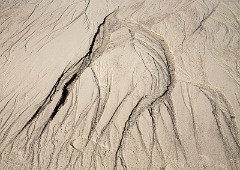 Wasserspuren im Sand 1